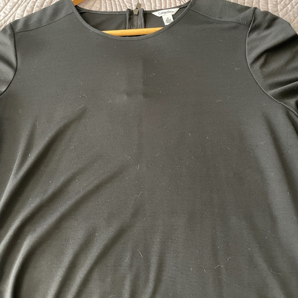 Calvin Klein black tee shirt with really cute zipper detailing in back size medi